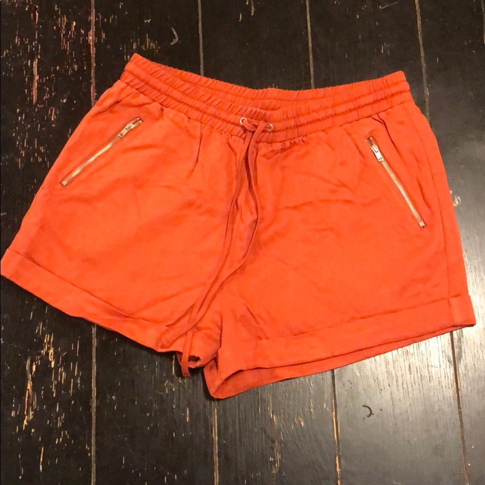 Orange stretch shorts